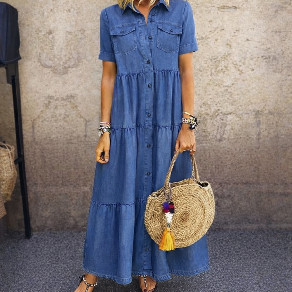Woman wearing button front midi dress with tiered skirt