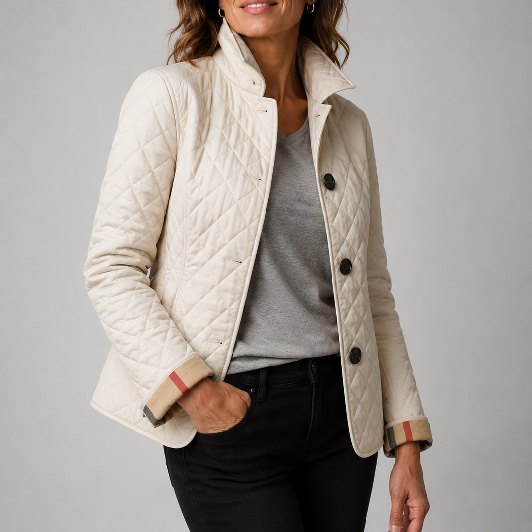 Woman wearing quilted button jacket with stand collar