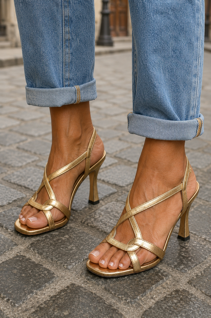 Women's gold heeled sandals with crossover straps