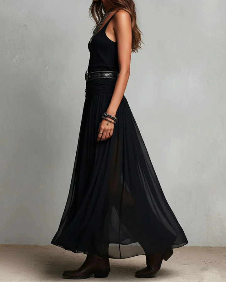 Woman wearing double layer maxi dress with belt