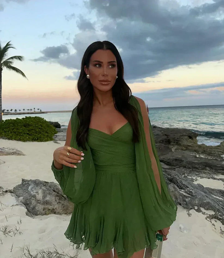 Woman wearing a mini dress in green, yellow or black