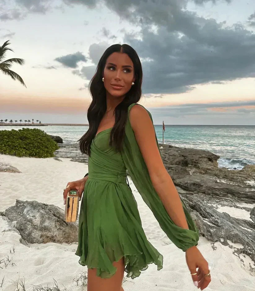 Woman wearing a mini dress in green, yellow or black