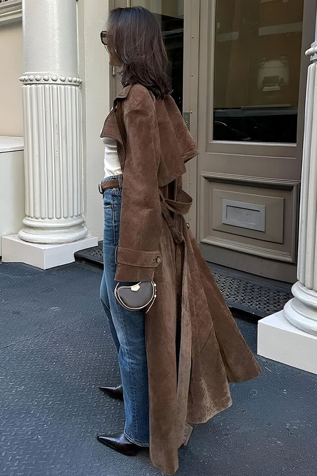 Woman wearing a women's raincoat for rainy days
