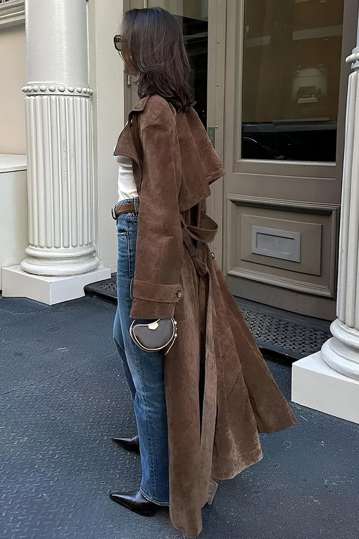 Woman wearing a women's raincoat for rainy days