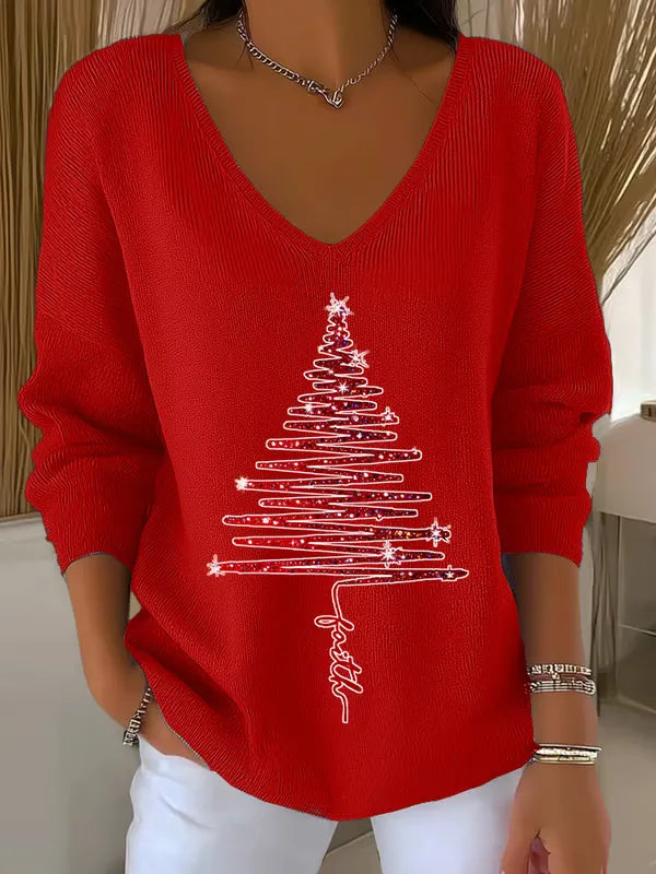 Woman wearing festive V-neck Christmas sweater with holiday print