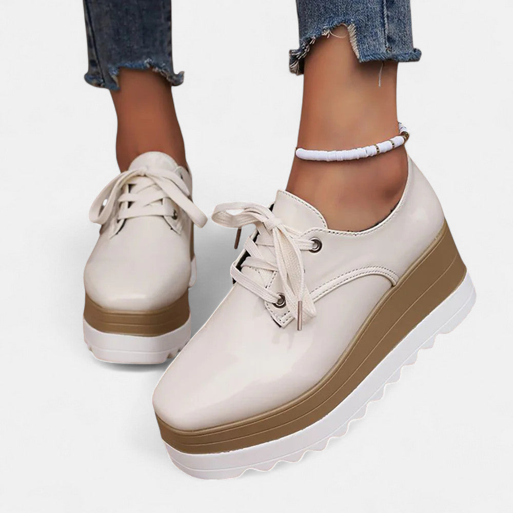 Women's black platform derby shoes with square toe and lace-up