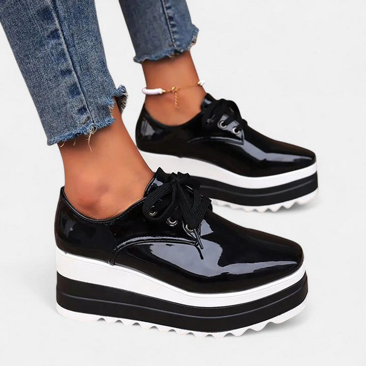 Women's black platform derby shoes with square toe and lace-up