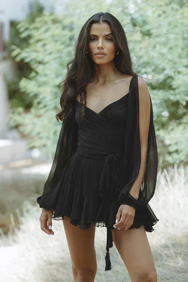 Woman wearing a mini dress in green, yellow or black