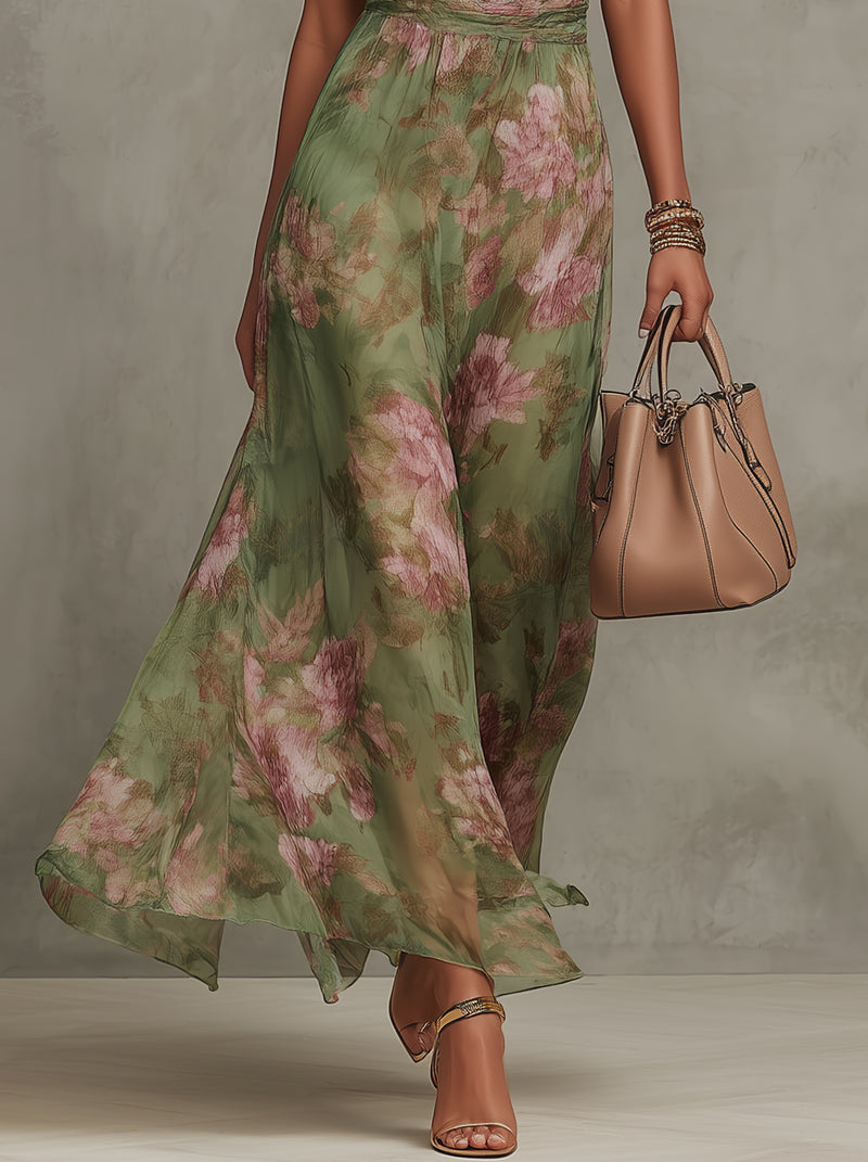 Woman wearing floral halter maxi dress with cinched waist