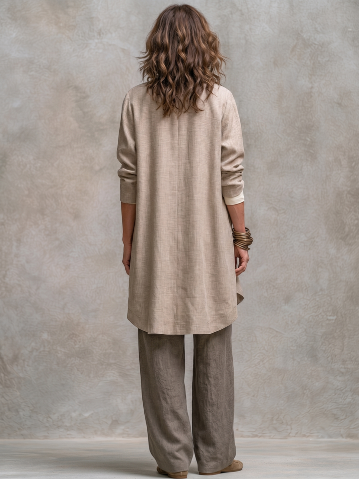 Woman wearing taupe wide leg three piece pant suit set