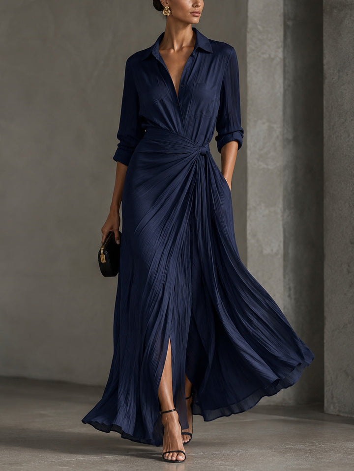 Woman wearing navy knotted V-neck maxi dress