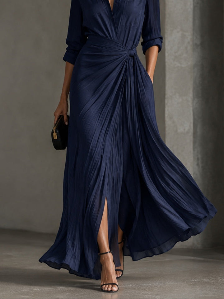 Woman wearing navy knotted V-neck maxi dress