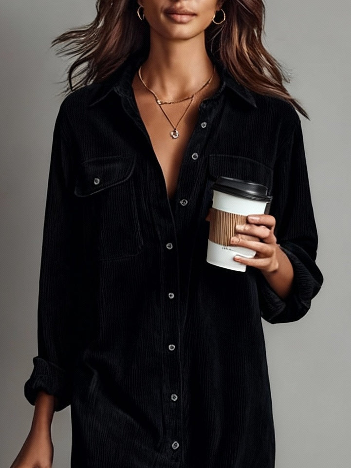 Woman wearing ribbed midi shirt dress with chest pockets