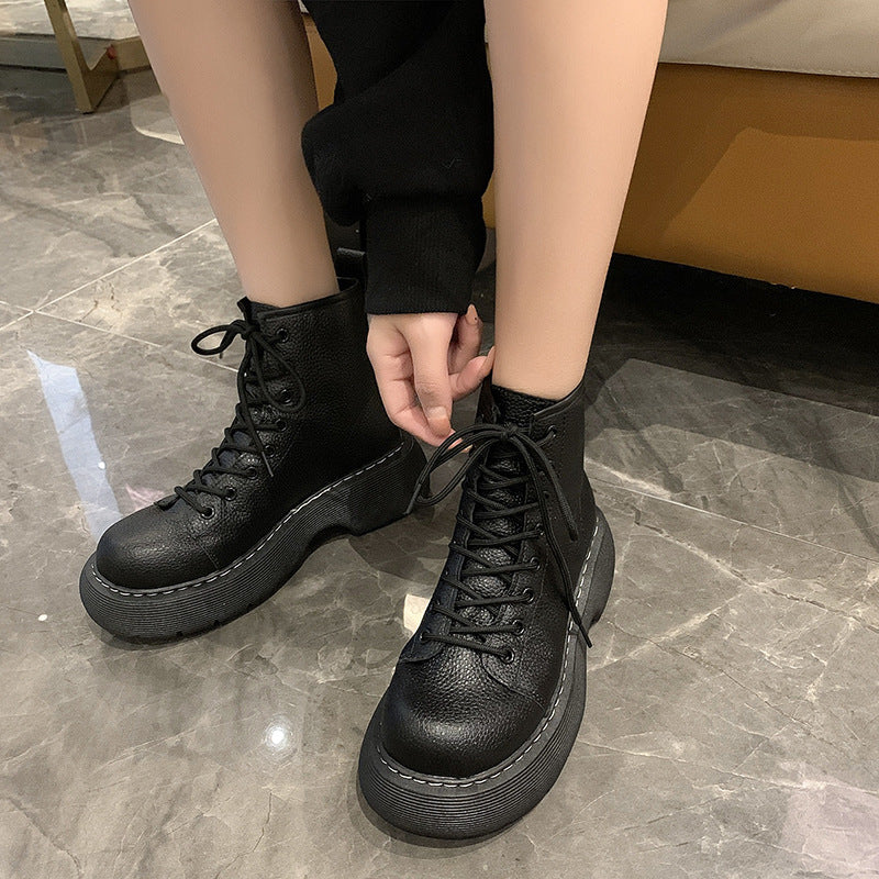 Women's black lace-up ankle boots with flat heel and round toe