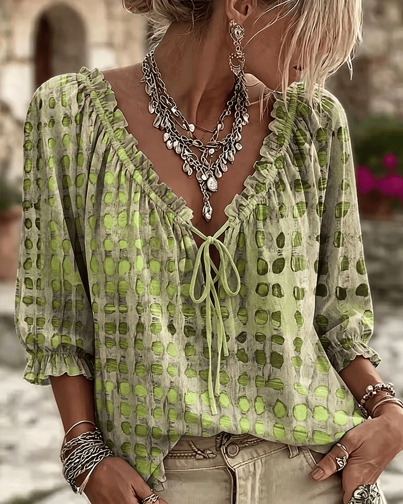Women's polka dot blouse with lace-up V-neck