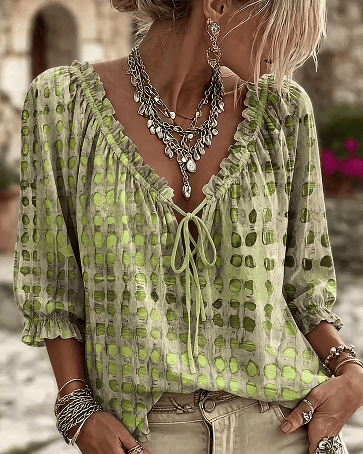 Women's polka dot blouse with lace-up V-neck