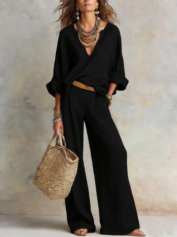Woman wearing relaxed V-neck top and wide-leg pants set