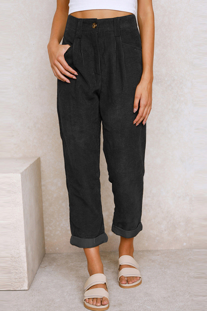 Woman wearing oversized high waist straight pants