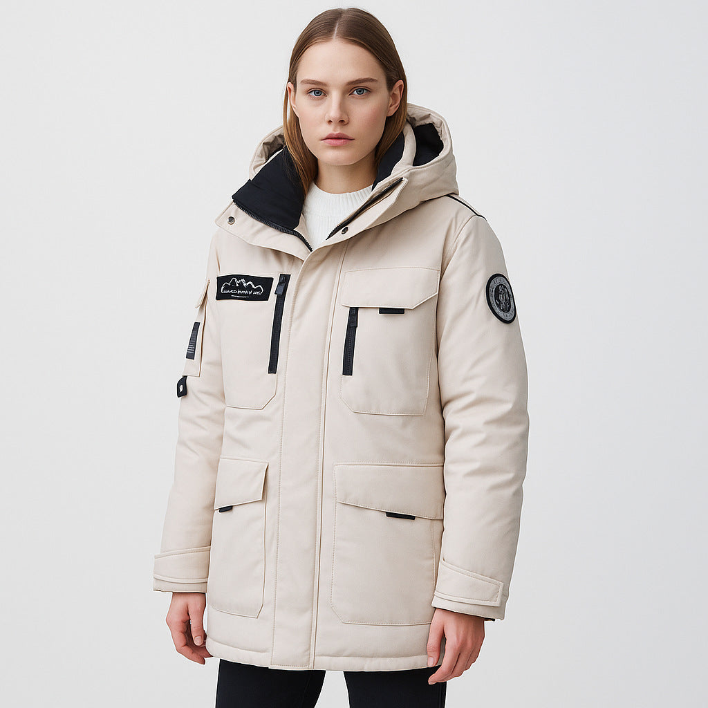 Woman wearing black hooded padded winter parka jacket outdoors