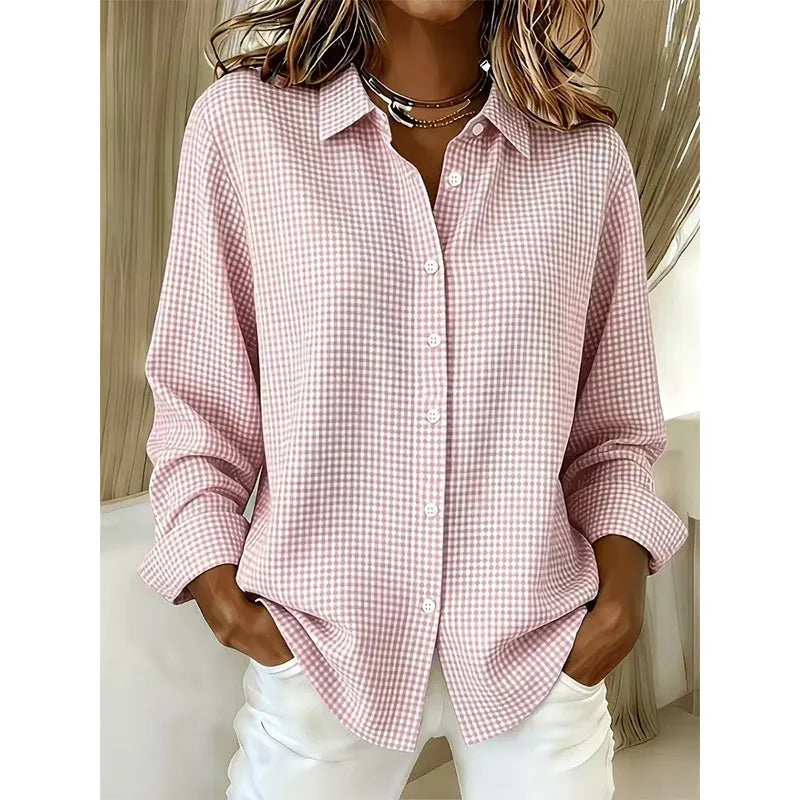 Woman wearing gingham button front long sleeve blouse