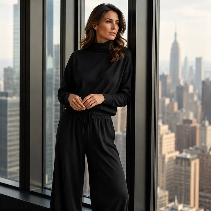 Woman wearing turtleneck two piece set with wide-leg pants