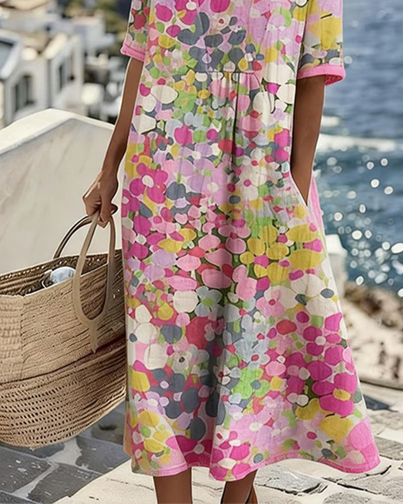 Woman wearing abstract floral print midi dress with short sleeves