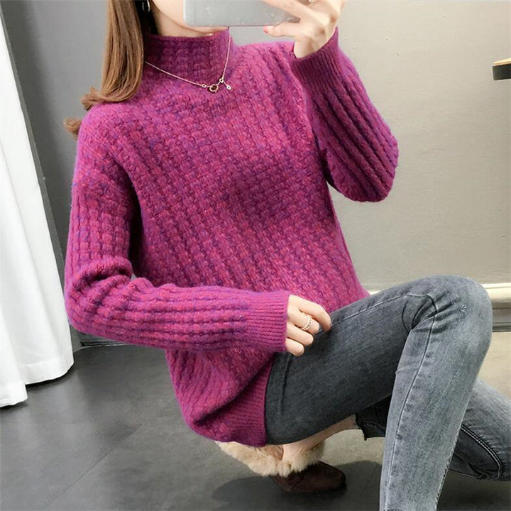 Women's cable knit turtleneck sweater front view