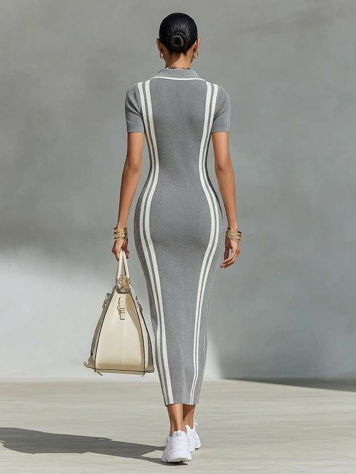 Woman wearing gray bodycon maxi dress with zip polo collar