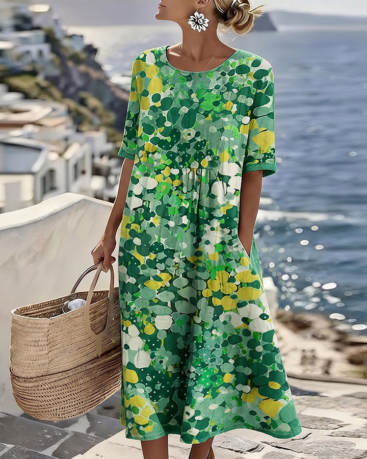 Woman wearing abstract floral print midi dress with short sleeves