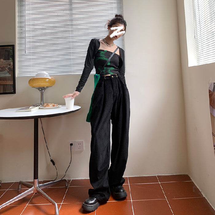 Woman wearing high waist wide leg pants in black