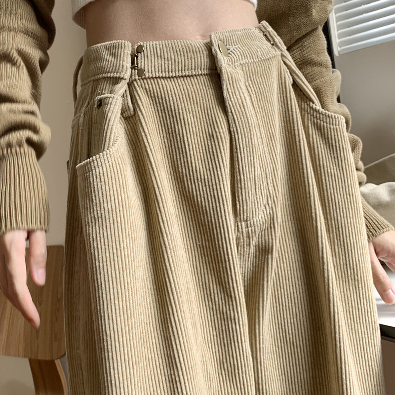 Woman wearing high waist wide leg pants in black
