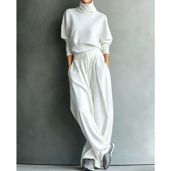 Woman wearing turtleneck two piece set with wide-leg pants