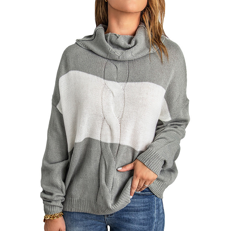 Woman wearing knit turtleneck sweater with contrast stitching