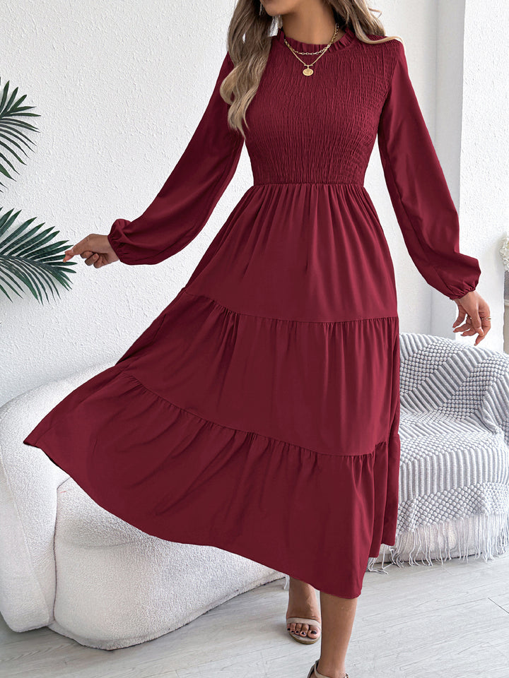 Long sleeve slim fit maxi dress with ruched detail
