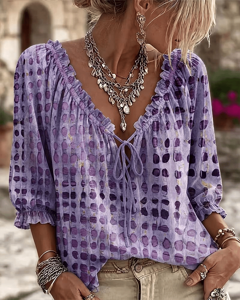 Women's polka dot blouse with lace-up V-neck