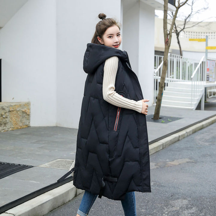 Women's long hooded puffer vest with zip closure