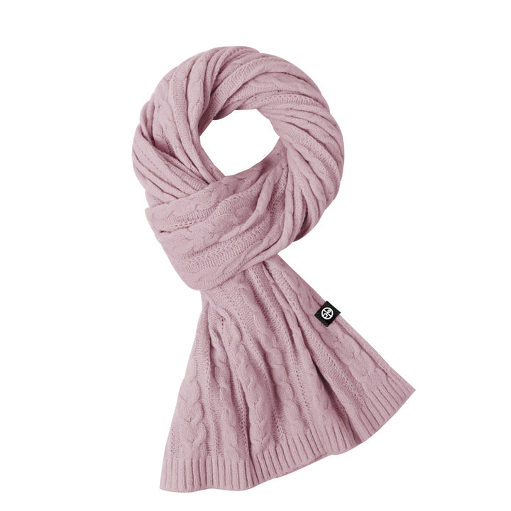 Woman wearing solid color long winter scarf outdoors