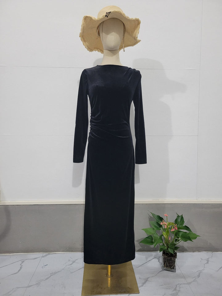 Woman wearing velvet long sleeve slim fit dress