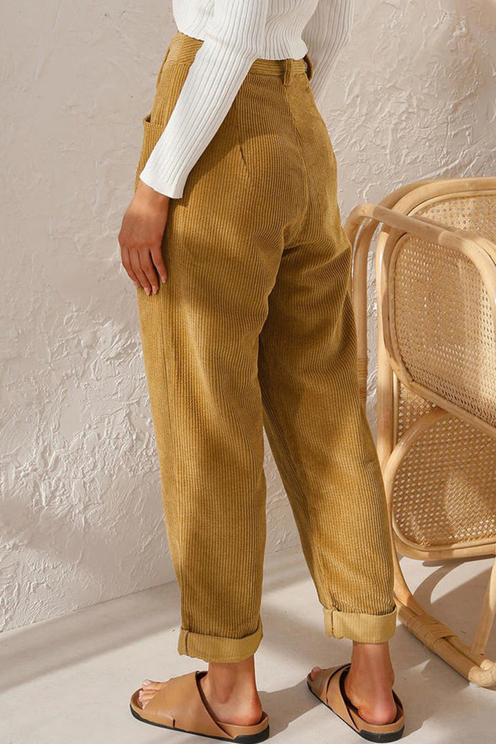 Woman wearing oversized high waist straight pants