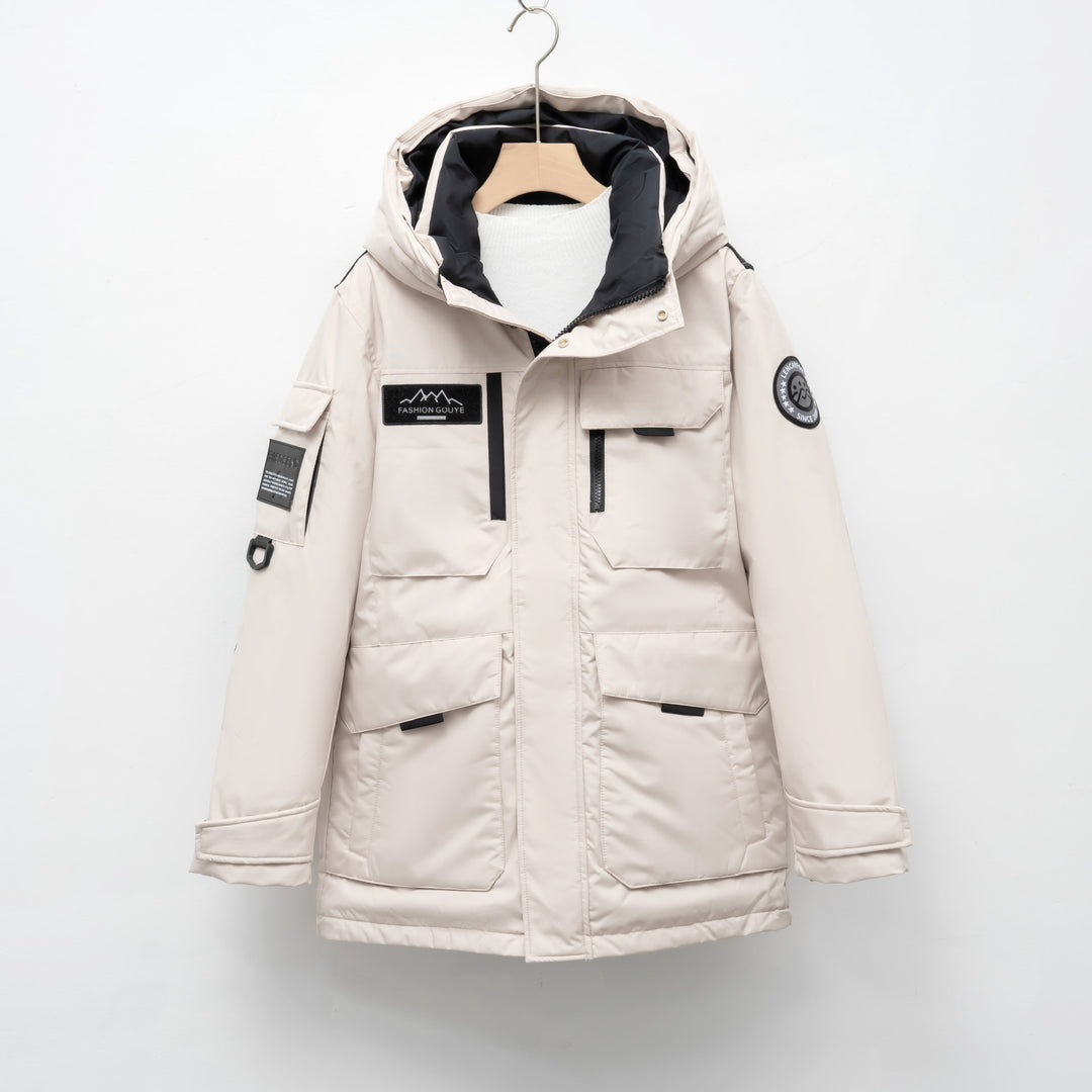 Woman wearing black hooded padded winter parka jacket outdoors