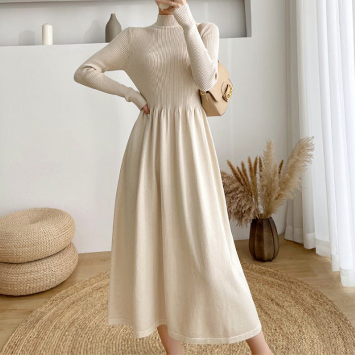 Women's mid-length knit sweater dress with elastic waist