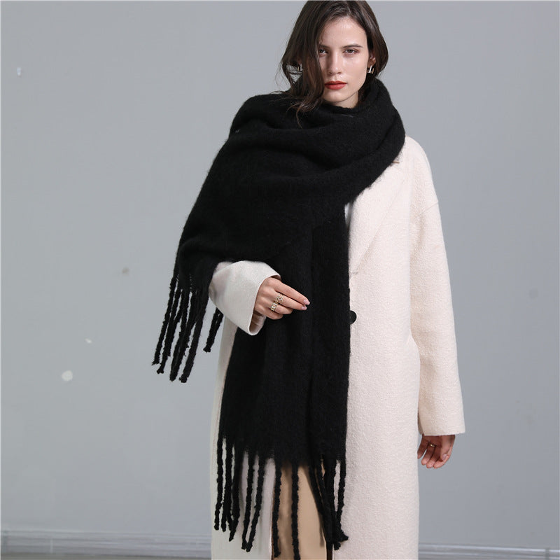Women's long solid color winter scarf with tassel ends