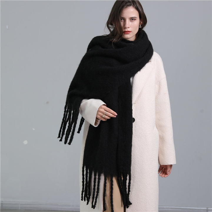 Women's long solid color winter scarf with tassel ends