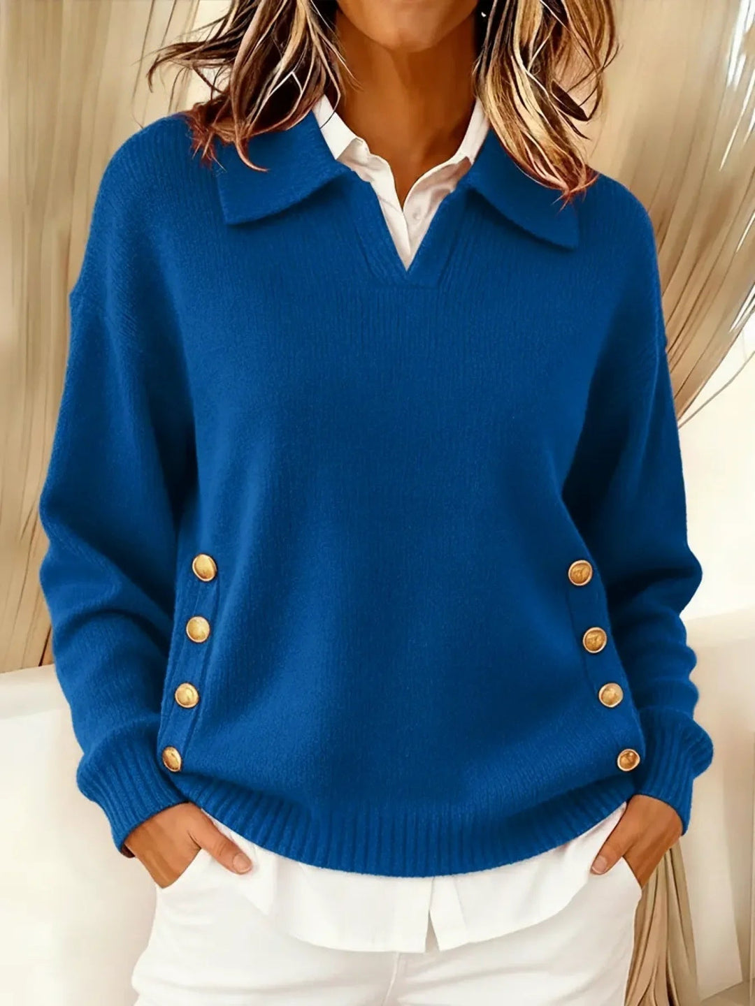 Woman wearing V-neck sweater with fold-over polo collar