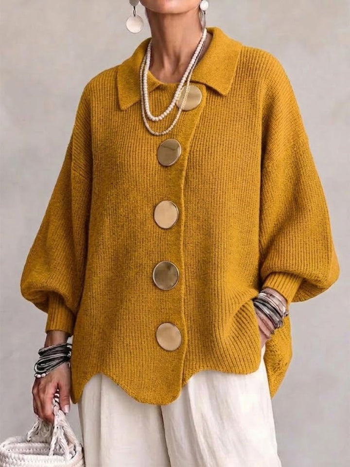 Woman wearing oversized cardigan with lantern sleeves