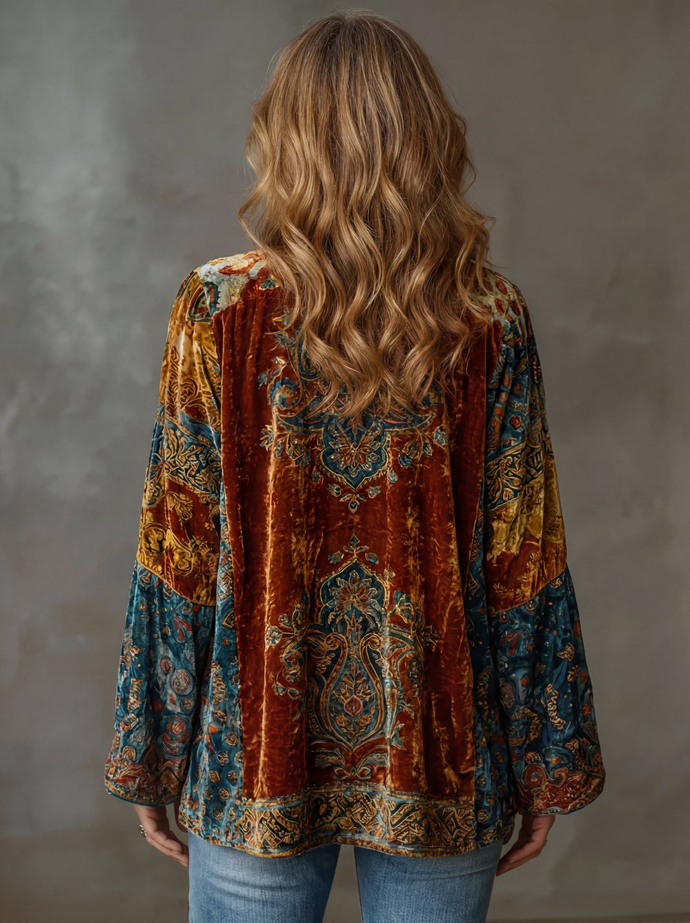 Woman wearing boho kimono jacket with open front