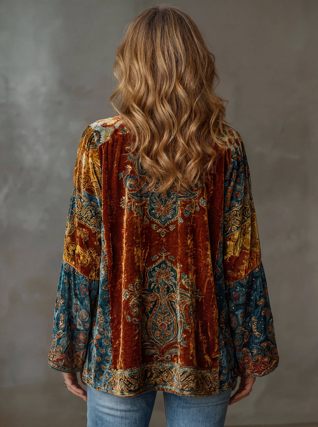 Woman wearing boho kimono jacket with open front