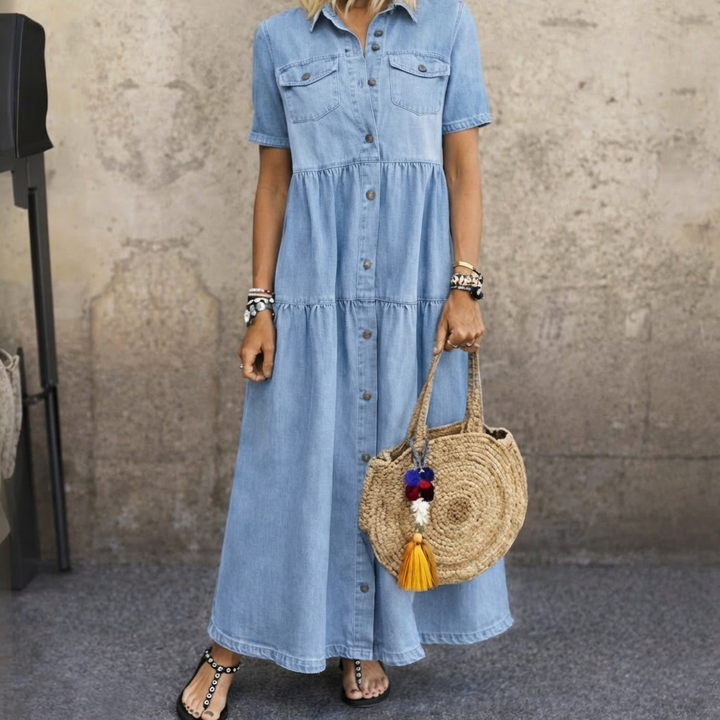 Woman wearing button front midi dress with tiered skirt