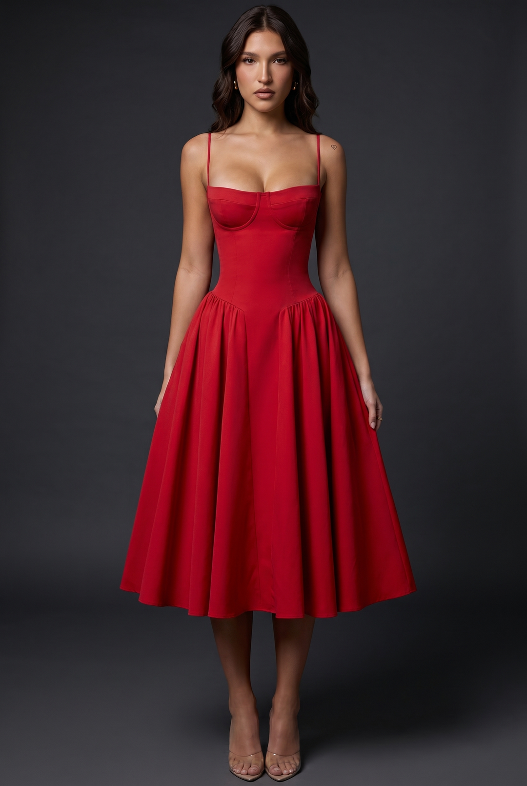 Woman in midi dress with structured bodice and flared skirt
