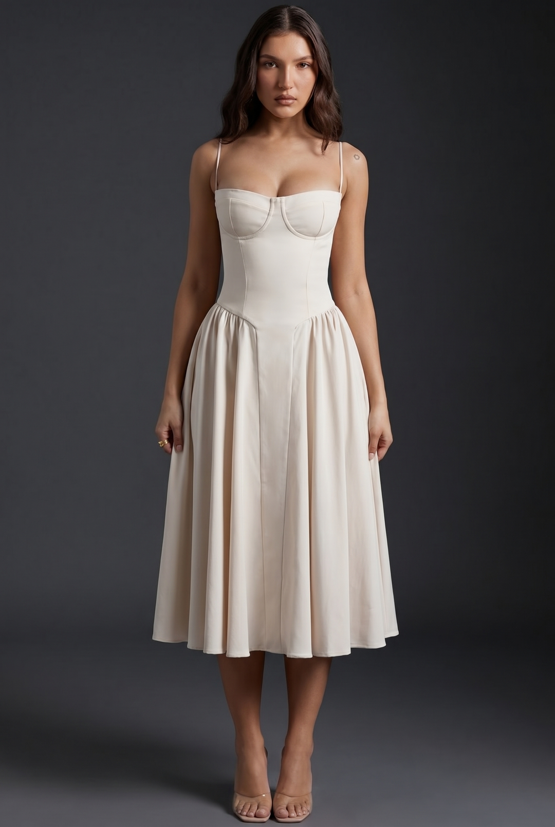 Woman in midi dress with structured bodice and flared skirt